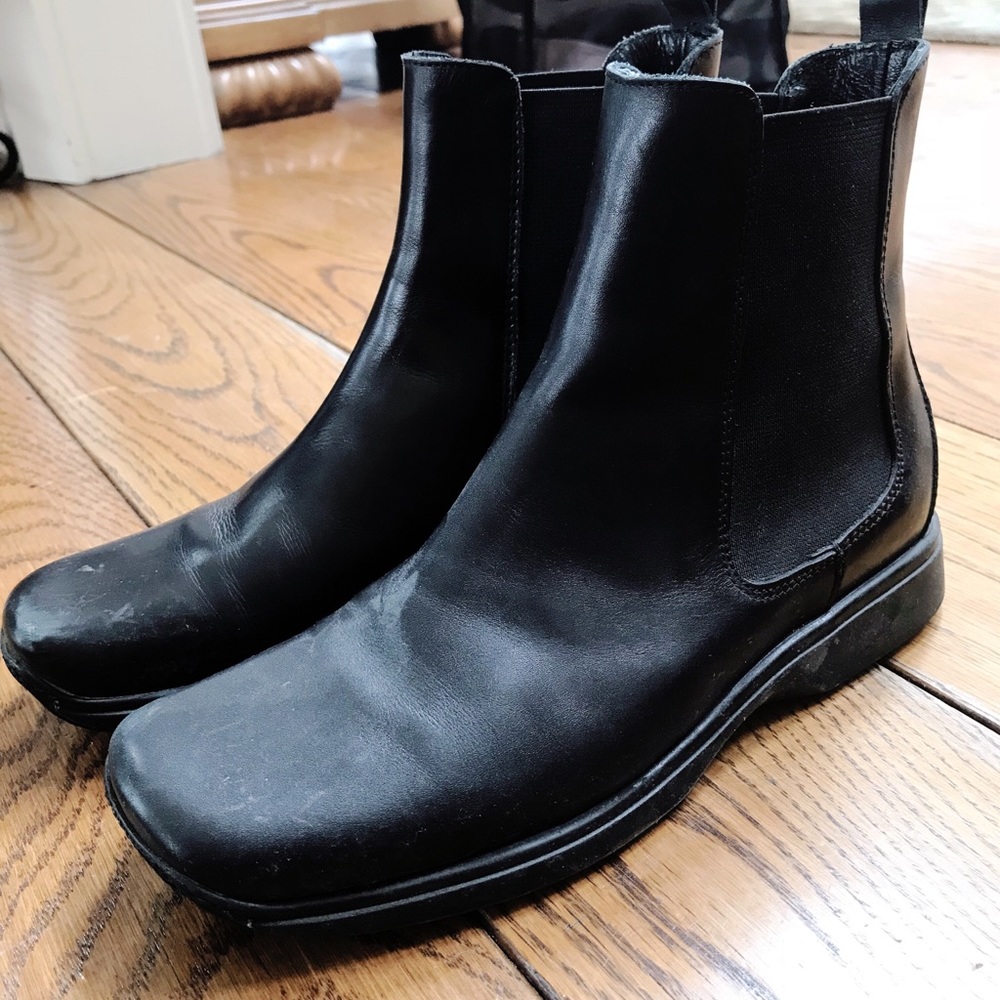 COACH boots, a little above ankle height.